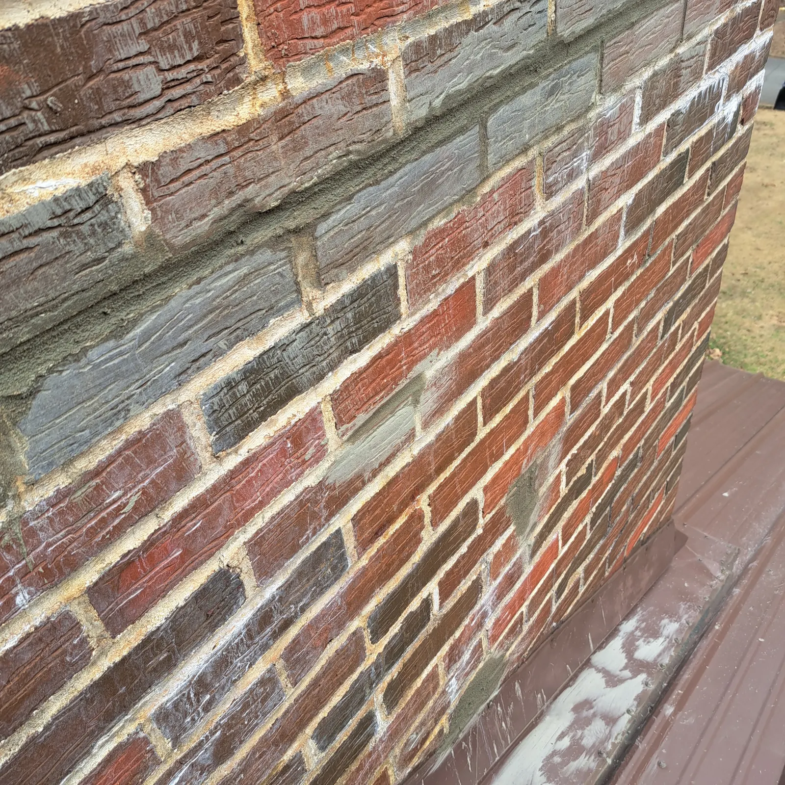 Close-up of chimney brick and mortar joints during an inspection